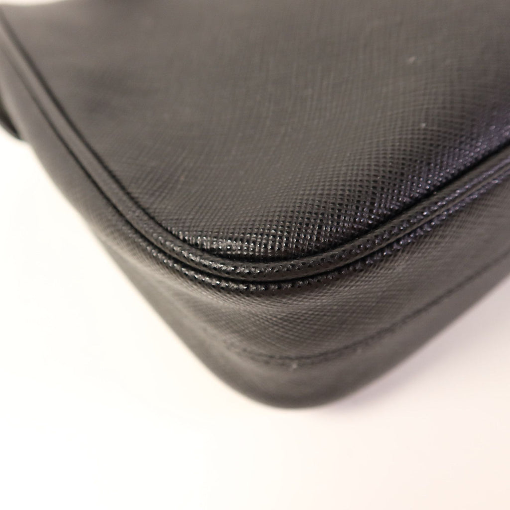 Prada Saffiano Leather Re-edition 2005 Golden Shoulder Bag Black Calfskin Condition: SA (NEW)