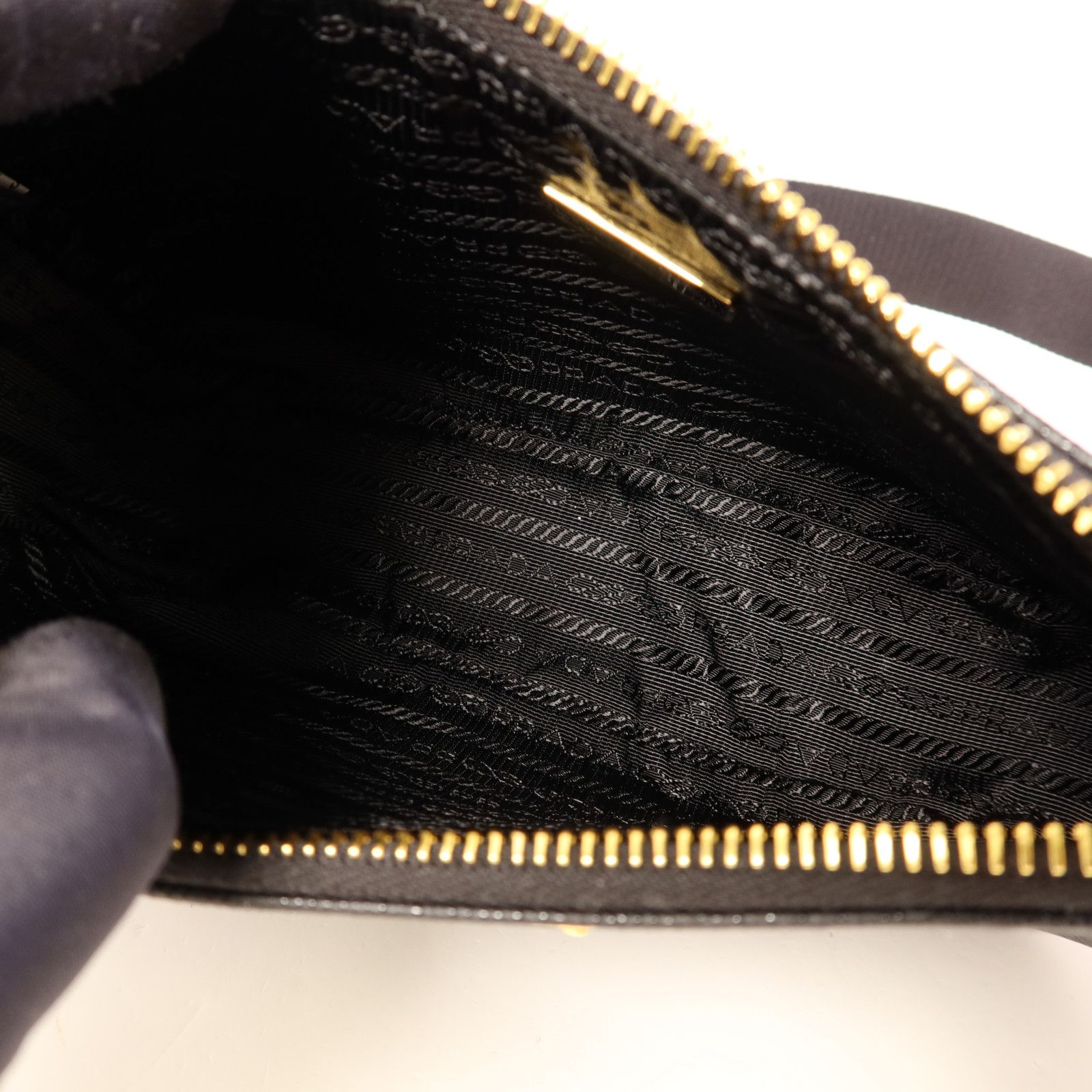 Prada Saffiano Leather Re-edition 2005 Golden Shoulder Bag Black Calfskin Condition: SA (NEW)