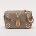 Bicolor monogram Empreinte Pochette Metis Beige