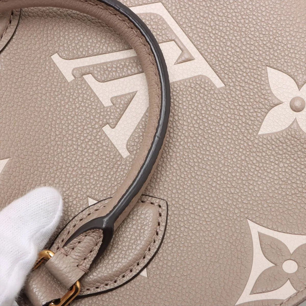 Louis Vuitton OnTheGo PM, Empreinte Giant Bicolor