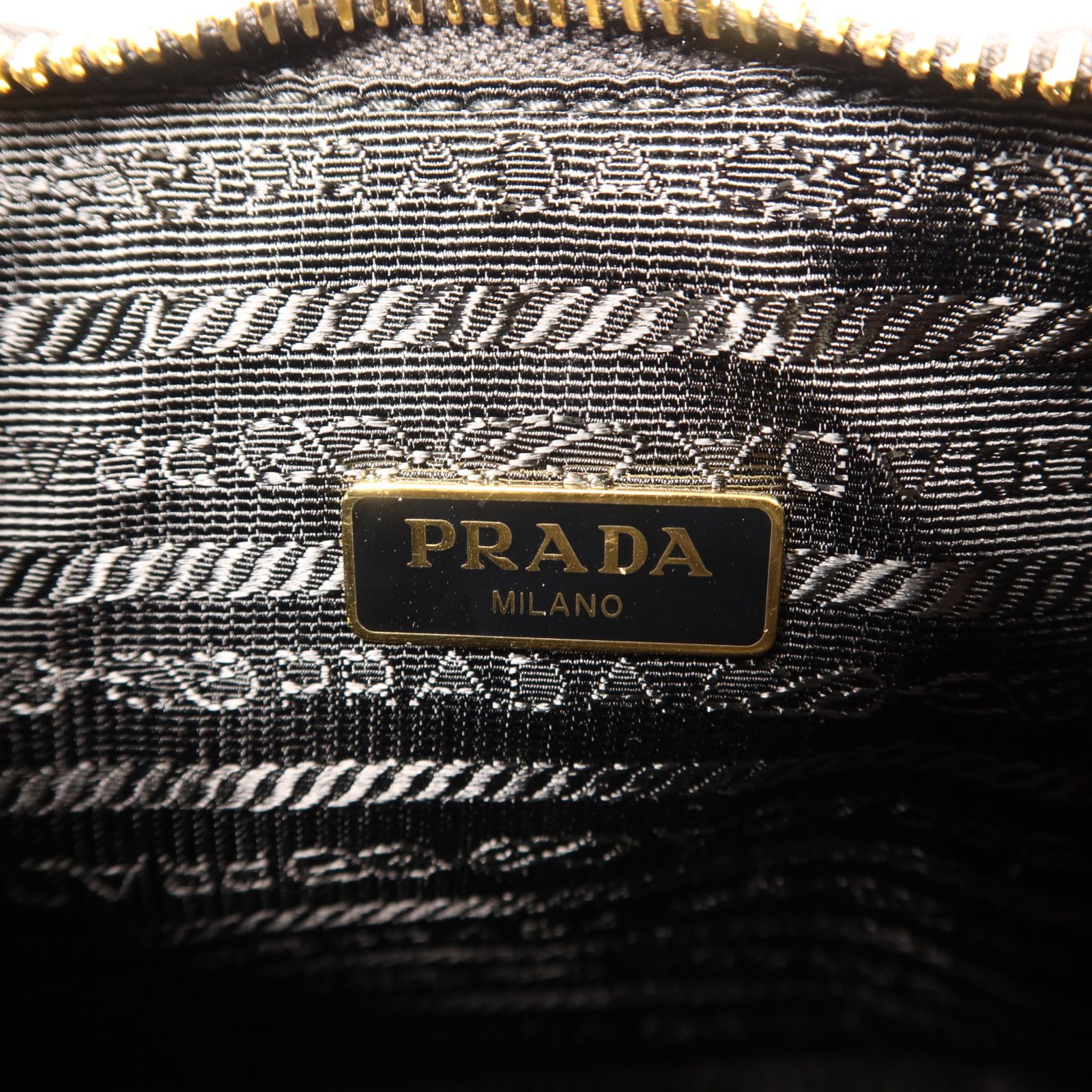 Prada Saffiano Leather Re-edition 2005 Golden Shoulder Bag Black Calfskin Condition: SA (NEW)