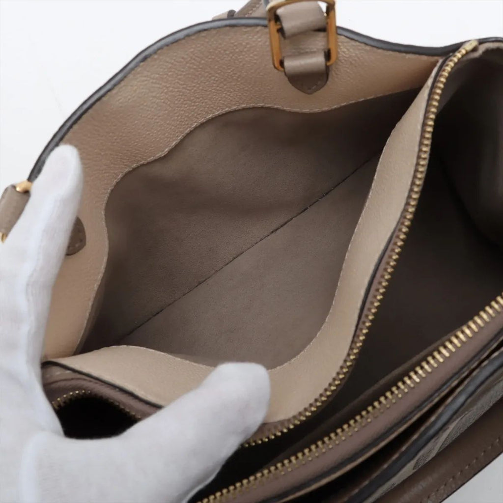 Louis Vuitton Petit palais Empreinte Monogram Giant Bicolor