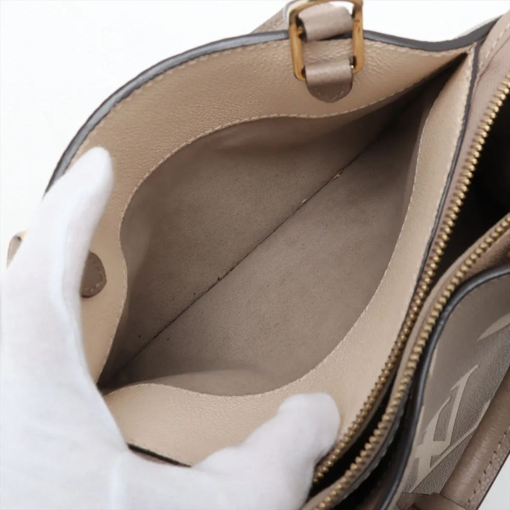 Louis Vuitton Petit palais Empreinte Monogram Giant Bicolor