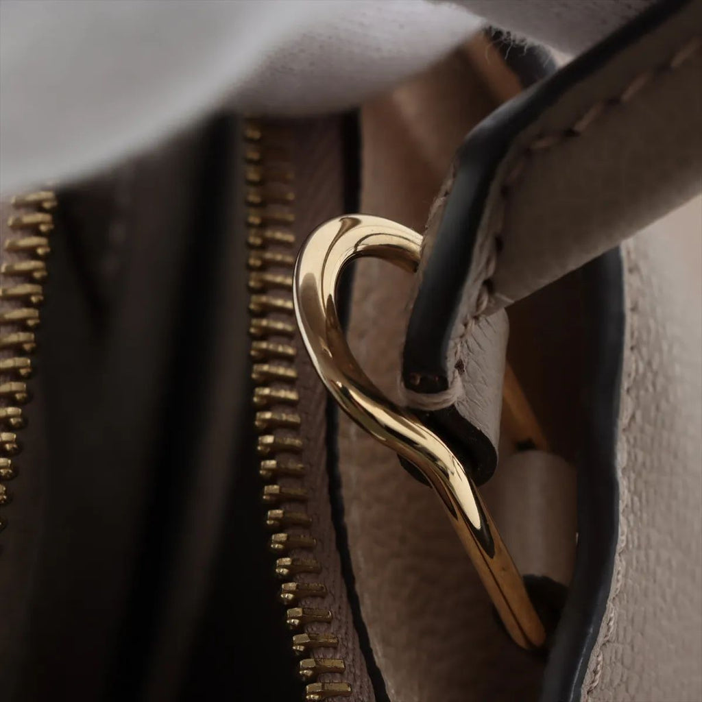 Louis Vuitton Petit palais Empreinte Monogram Giant Bicolor