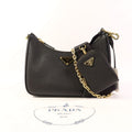 Prada Saffiano Leather Re-edition 2005 Golden Shoulder Bag Black Calfskin Condition: SA (NEW)