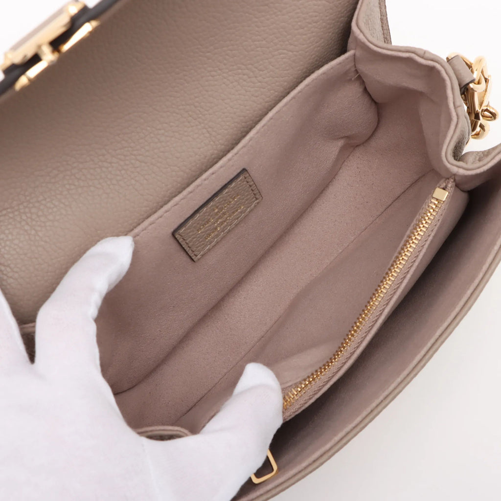 Bicolor monogram Empreinte Pochette Metis Beige
