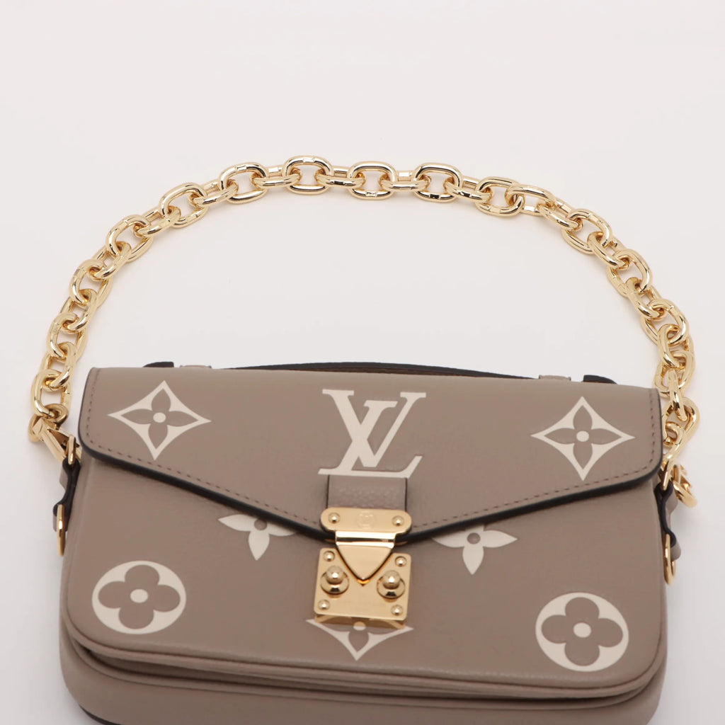 Bicolor monogram Empreinte Pochette Metis Beige