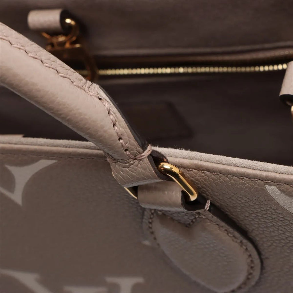 Louis Vuitton OnTheGo PM, Empreinte Giant Bicolor