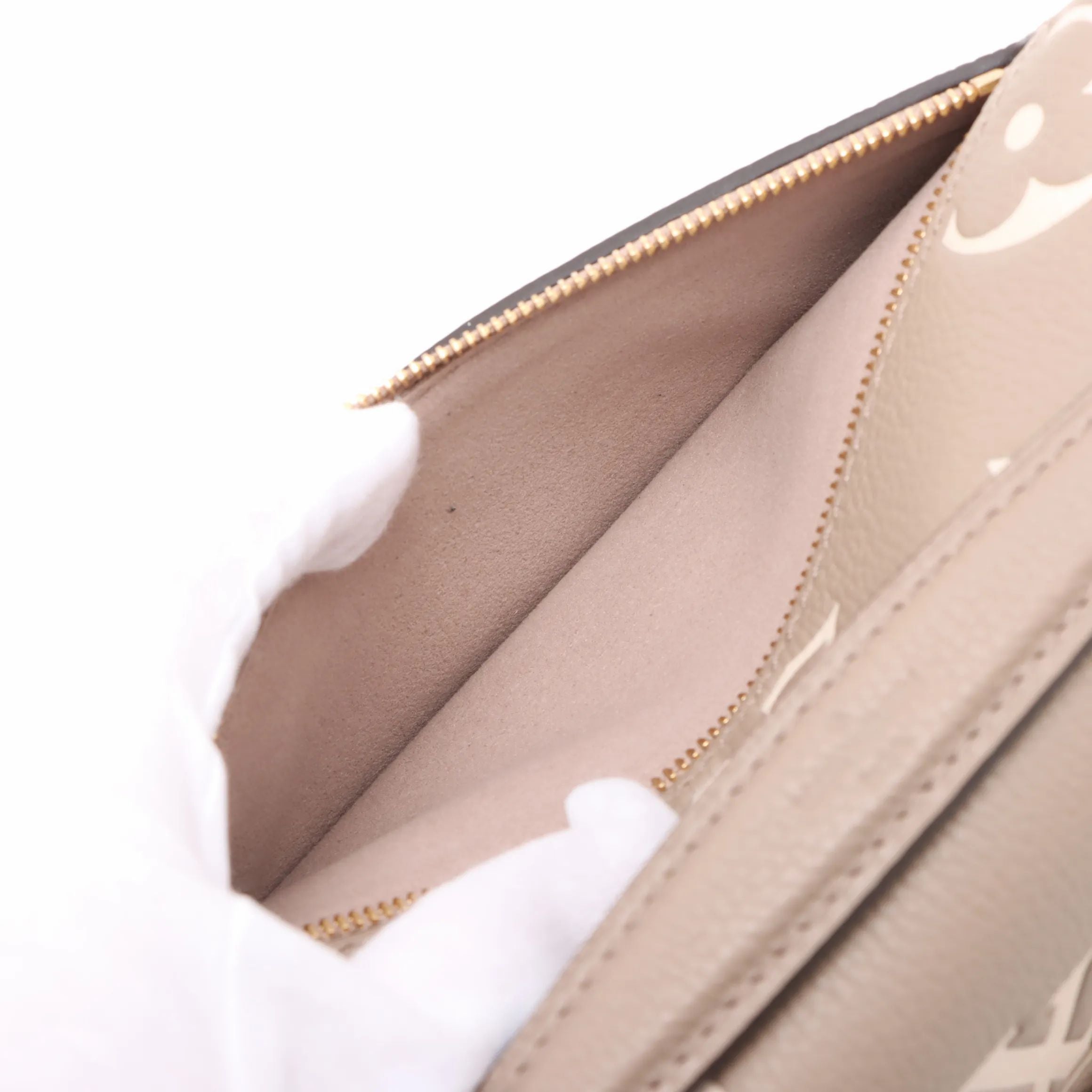Bicolor monogram Empreinte Pochette Metis Beige