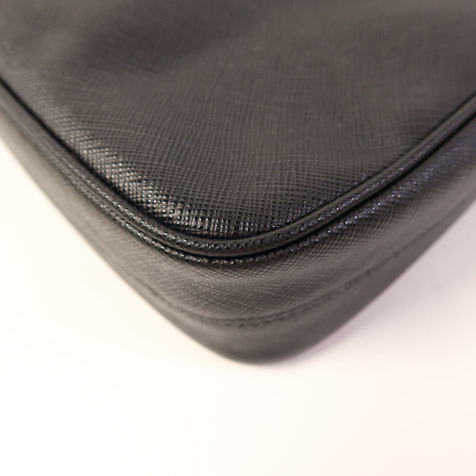Prada Saffiano Leather Re-edition 2005 Golden Shoulder Bag Black Calfskin Condition: SA (NEW)