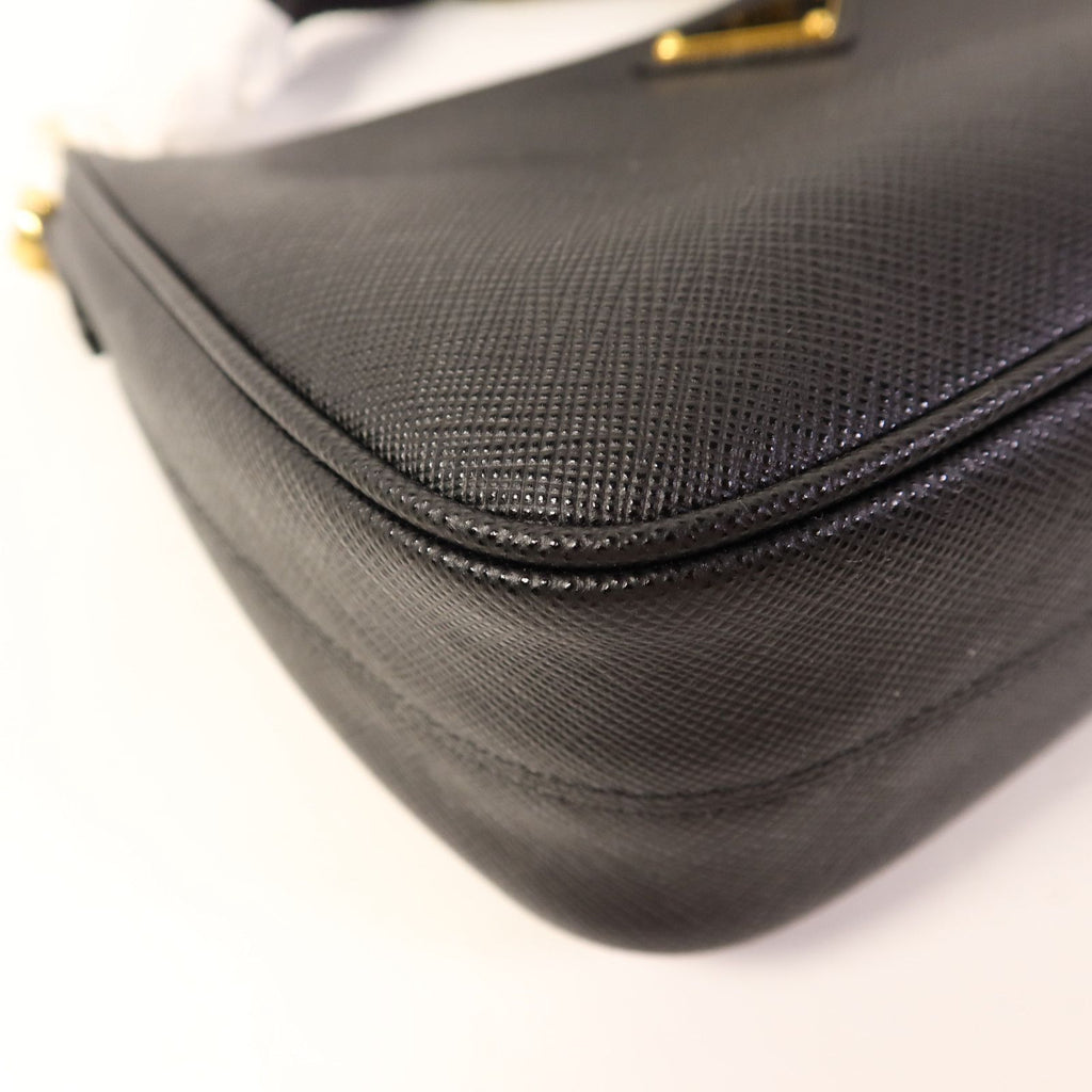 Prada Saffiano Leather Re-edition 2005 Golden Shoulder Bag Black Calfskin Condition: SA (NEW)