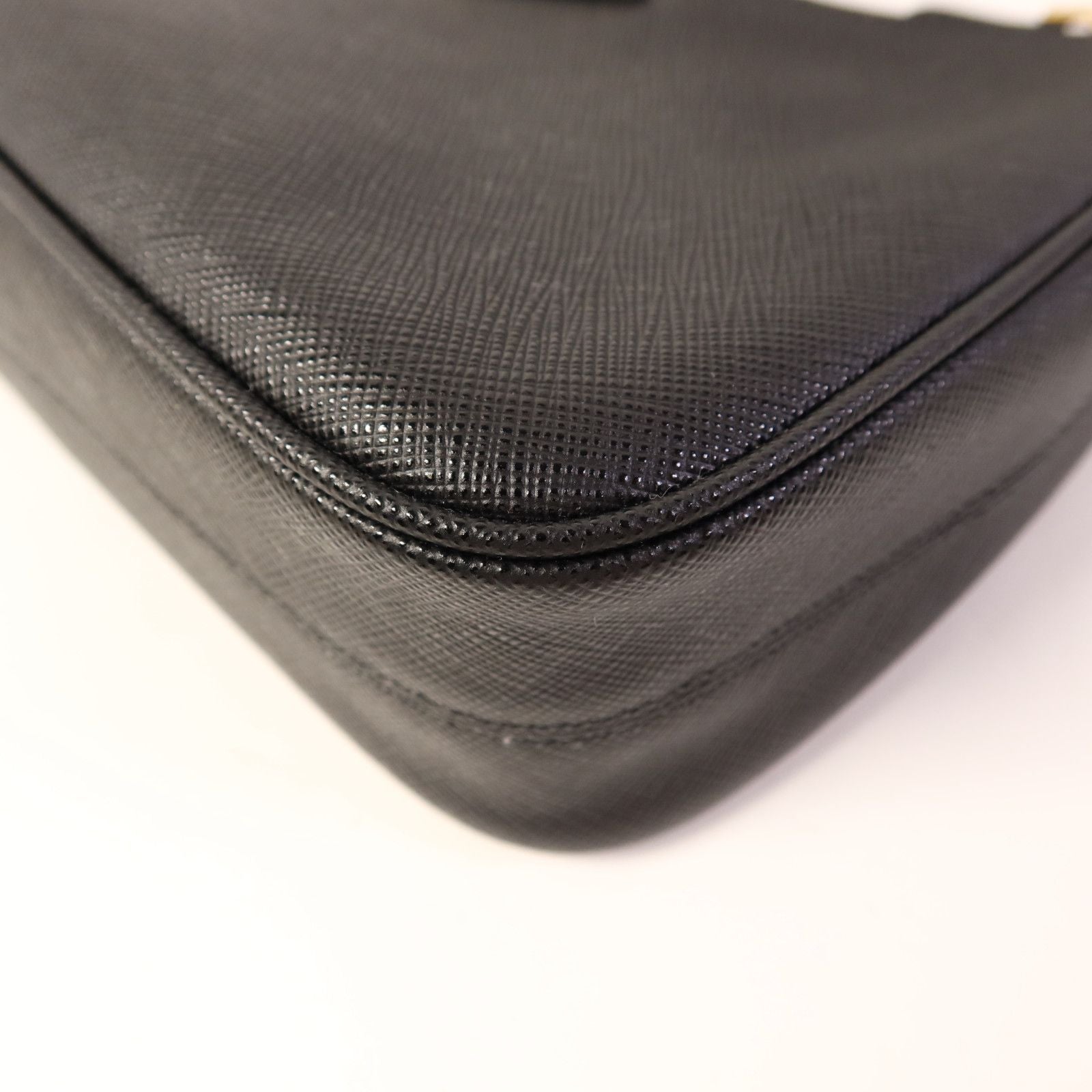 Prada Saffiano Leather Re-edition 2005 Golden Shoulder Bag Black Calfskin Condition: SA (NEW)