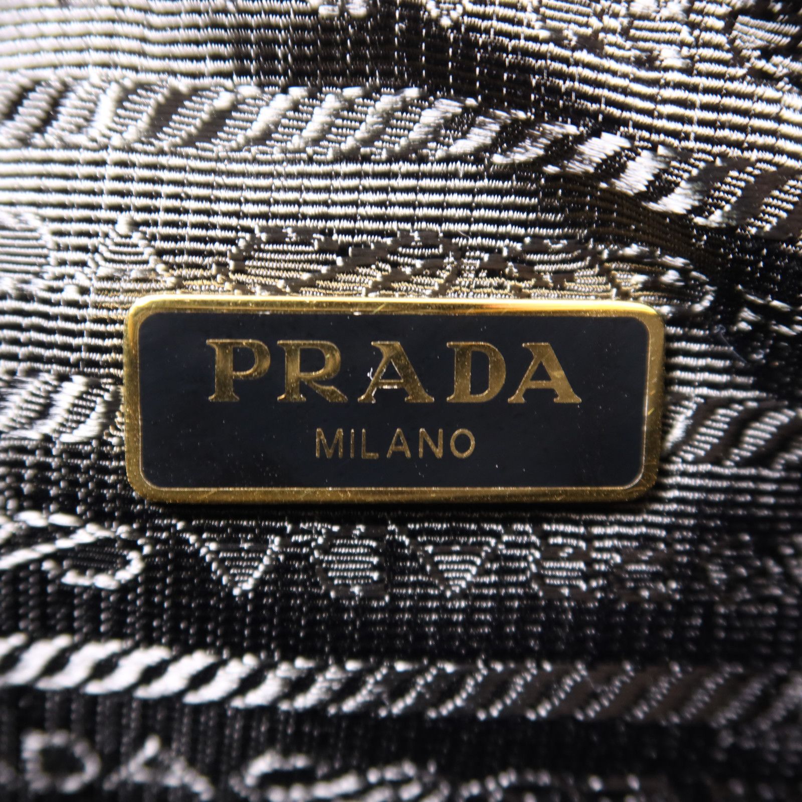 Prada Leather Re-edition 2005 Golden Shoulder Back Bag Black Saffiano